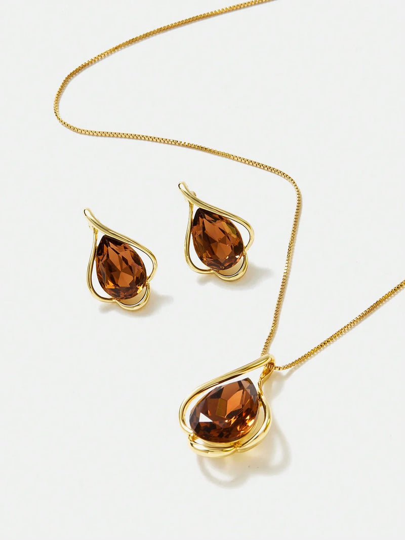 Conjunto de pendientes y collar de circonitas cúbicas con brillo de cobre champán