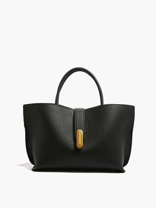 Bolso de hombro texturizado con asa superior a juego