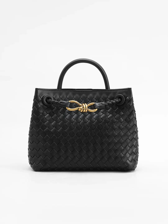 Bolso con asa de metal