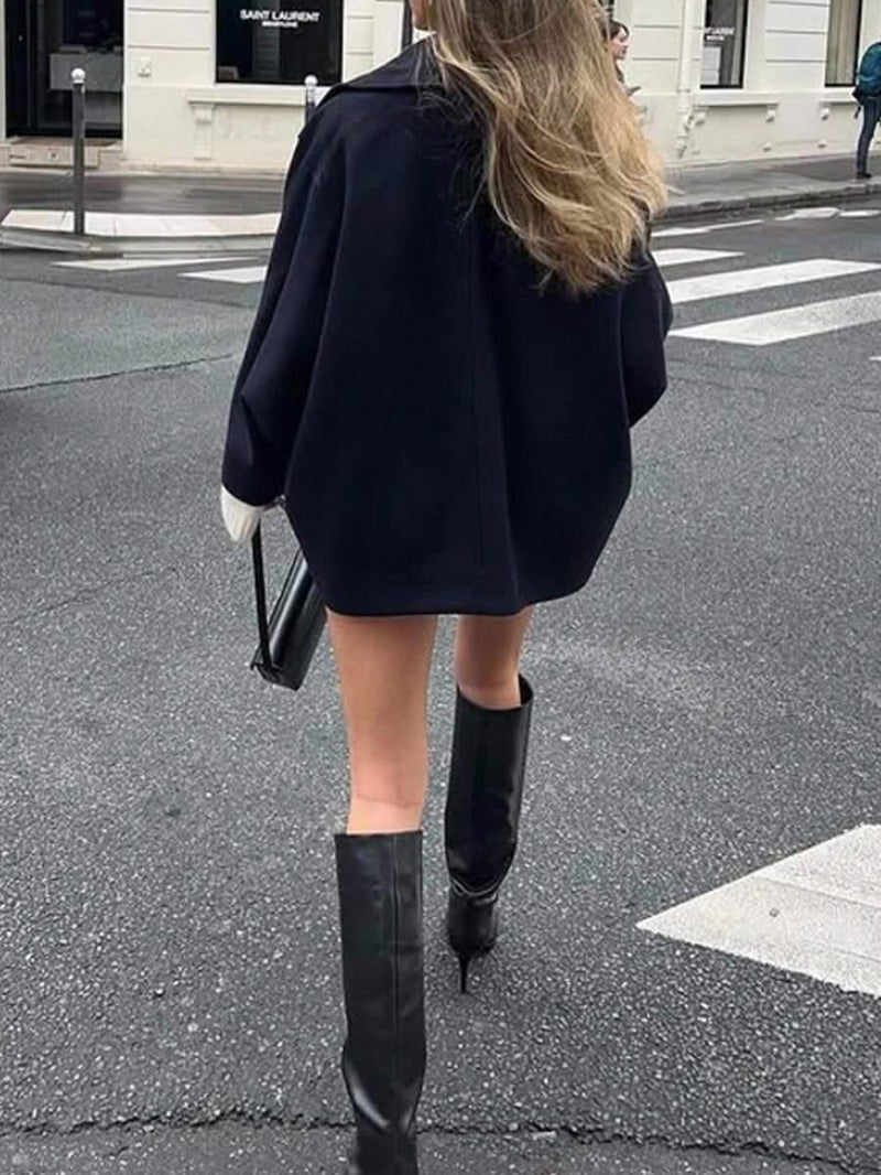 Chaqueta de lana con hombros abiertos, cuello alto y solapa