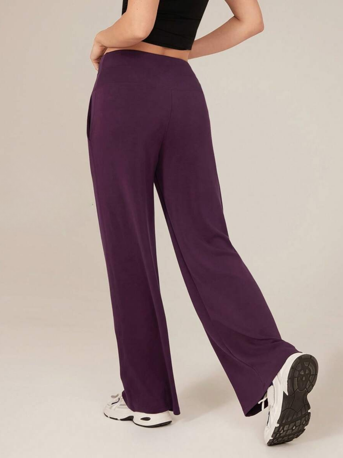 Pantalones de salón de seda modal con pierna ancha y cintura alta con bolsillos para mayor comodidad y estilo diario.