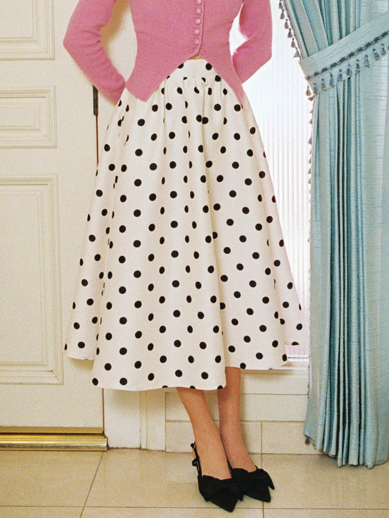 Falda larga con volantes, bolsillos y lunares de talle medio